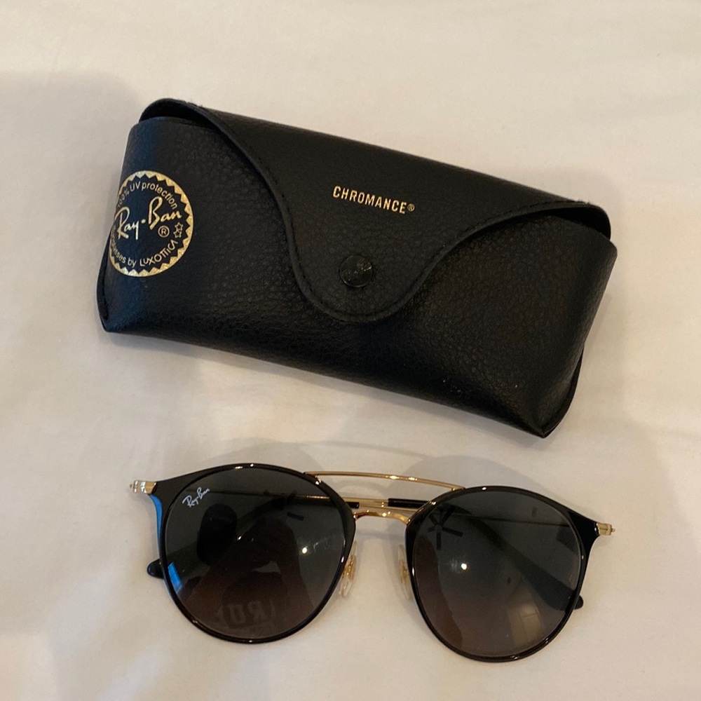 Rayban sunglasses has a minor scratch as shown in the picture hardly noticable